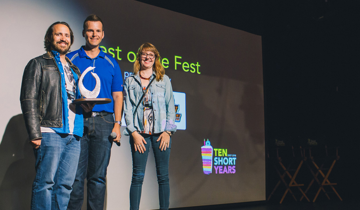 Lucas-&-Christina-accept-award-for-The-OceanMaker